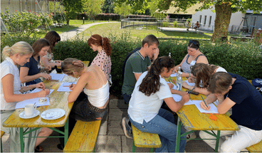 Ideenwerkstatt der Sommerakademie mit den Teilnehmenden.